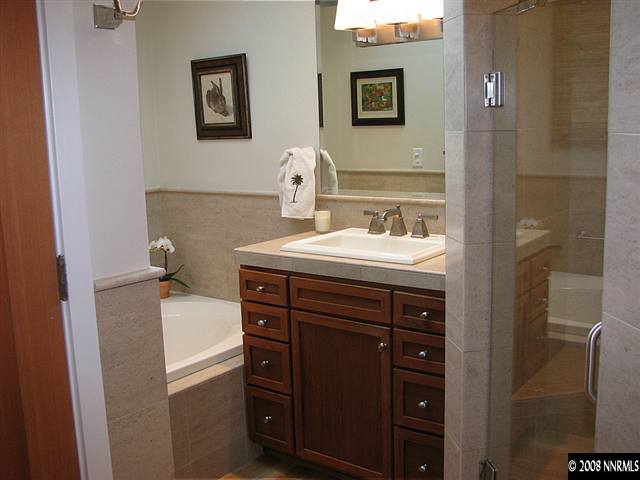 2170 Lander Street Reno, NV 89509 - Photo 8 of 9 a bathroom with a sink vanity and mirror