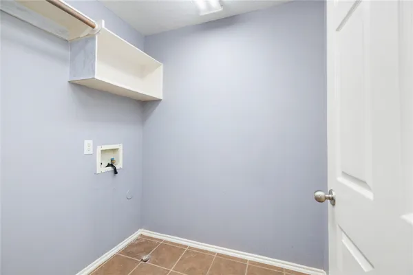 a view of a hallway with closet