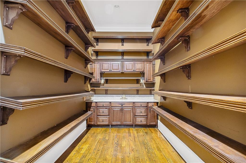9830 Cedar Grove Road Fairburn, GA 30213 - Photo 35 of 55 a kitchen with stainless steel appliances granite countertop a sink and cabinets