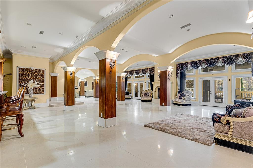 9830 Cedar Grove Road Fairburn, GA 30213 - Photo 46 of 55 a lobby with furniture and a large window