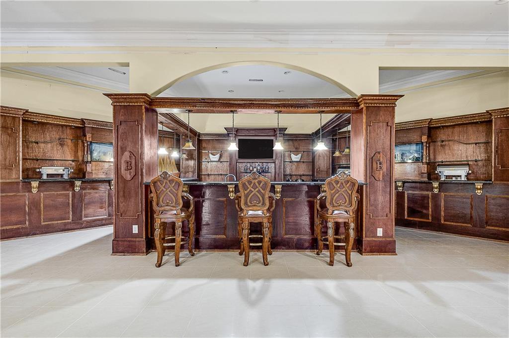 9830 Cedar Grove Road Fairburn, GA 30213 - Photo 47 of 55 a view of a room with gym equipment