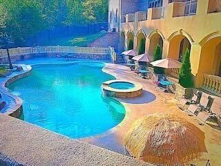 9830 Cedar Grove Road Fairburn, GA 30213 - Photo 53 of 55 a view of a swimming pool with a patio