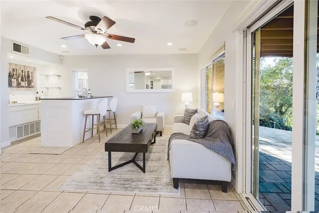 a living room with furniture and a window