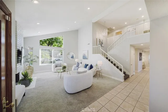 a living room with furniture and a table
