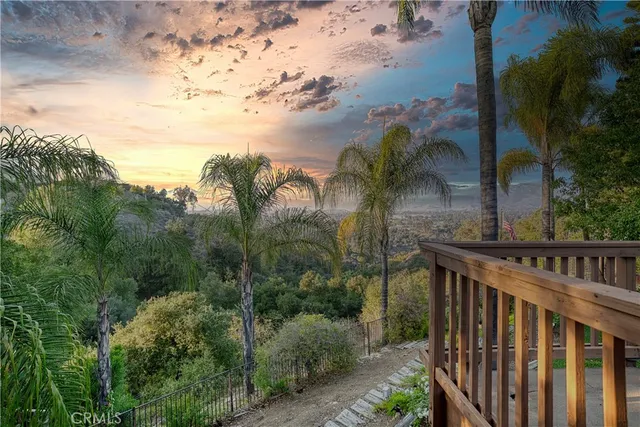 a view of a backyard of the house