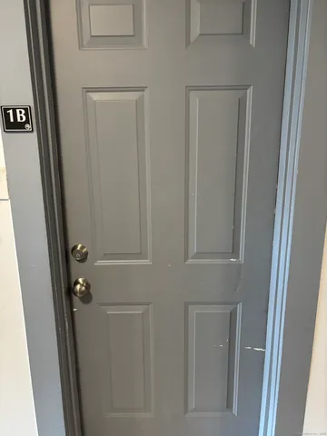 a bathroom with a glass door