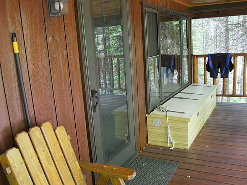 440 Birches Beach Road Oquossoc, ME 04964 - Photo 12 of 35 Covered Porch.