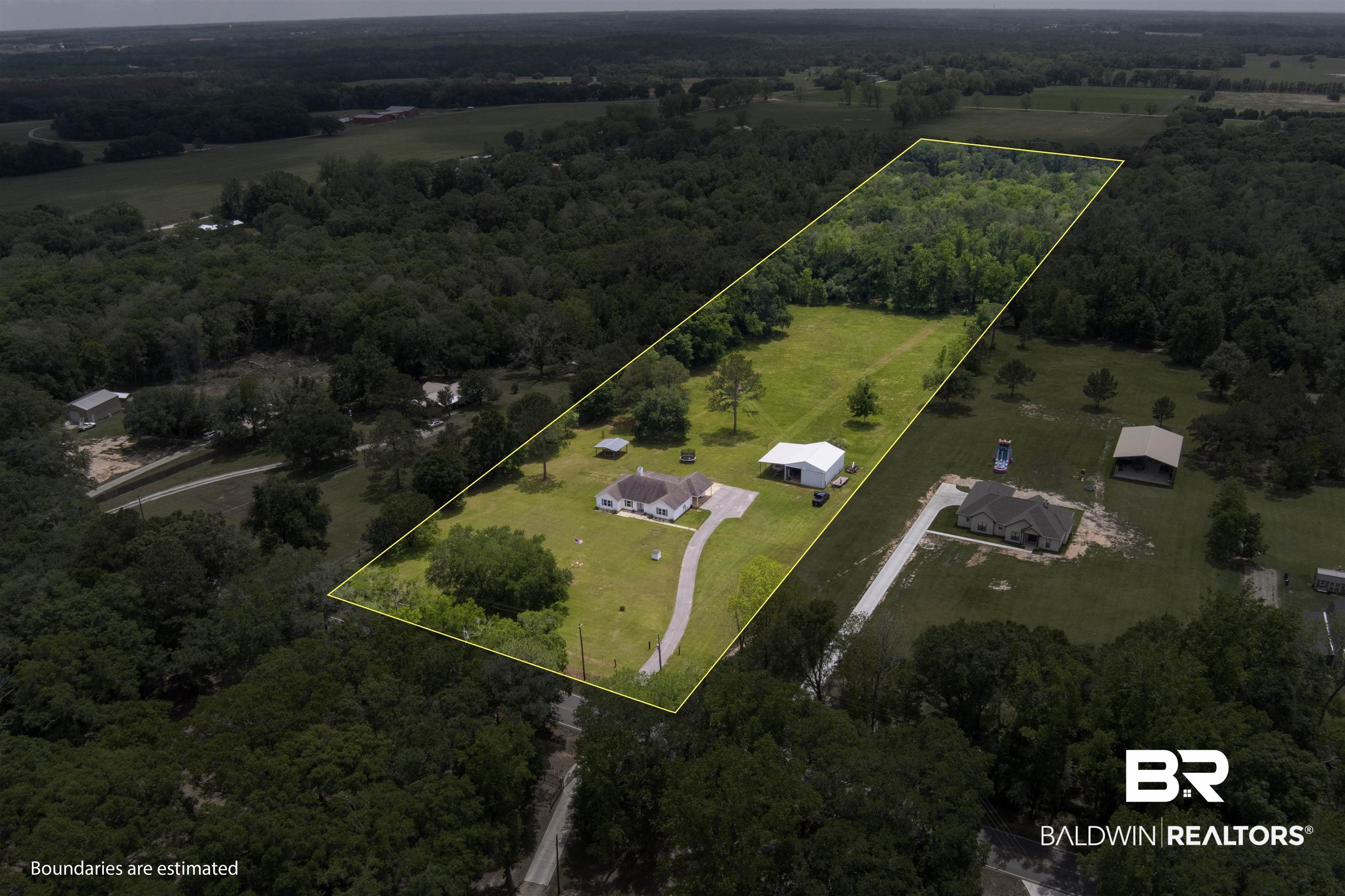 13925 Fort Lake Road Grand Bay, AL 36541 - Photo 25 of 37 Birds eye view of property with a wooded view