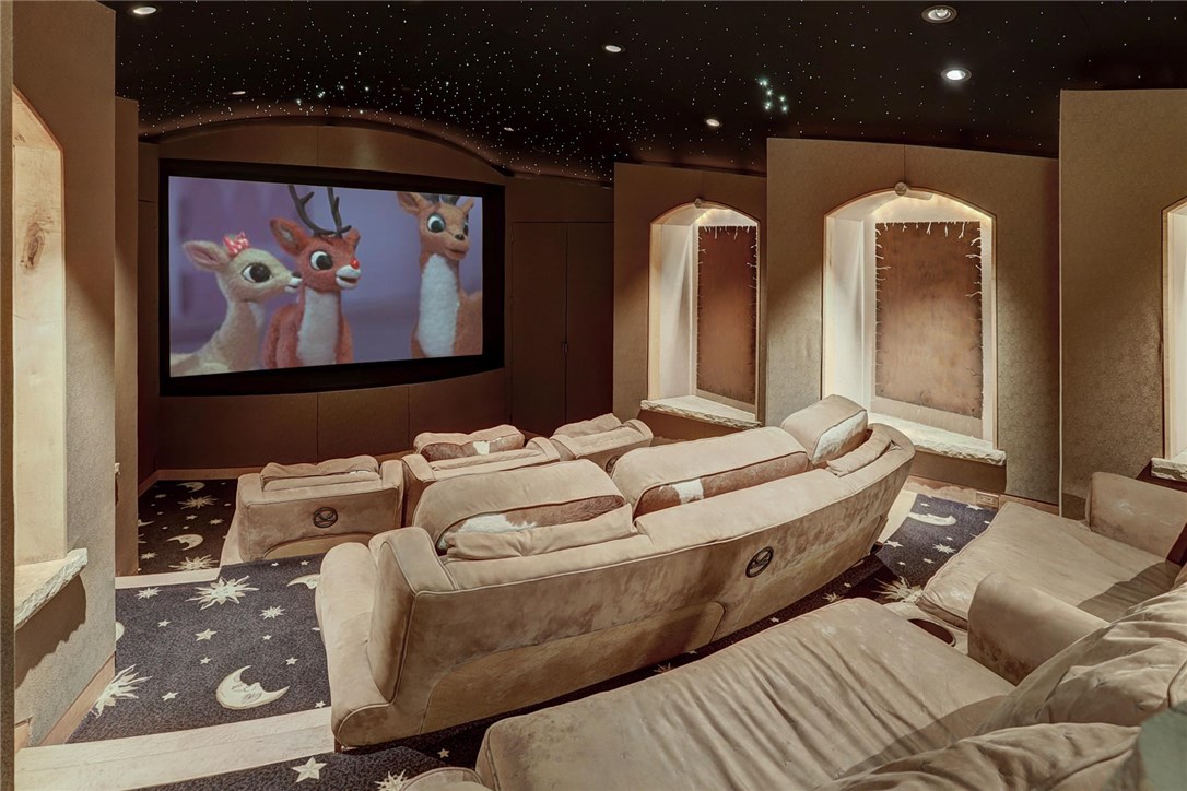 1381 Johnson Road Silverthorne, CO 80498 - Photo 27 of 35 Also on the lower level is the theater! Sound proof, high end sound system, and luxurious seating. This room is decked out!