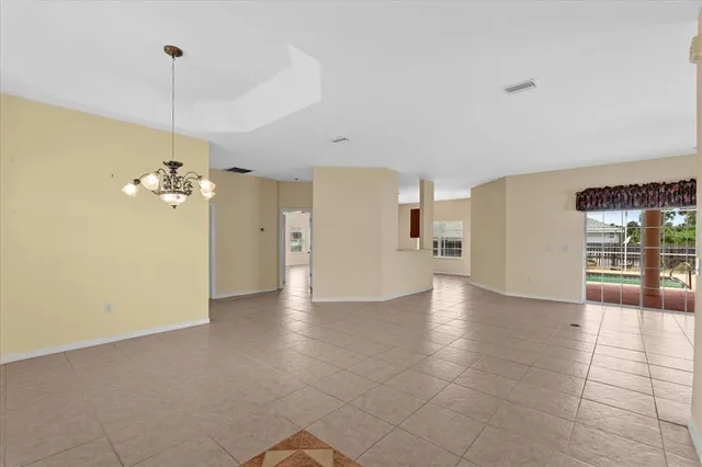 a view of an empty room with a fireplace