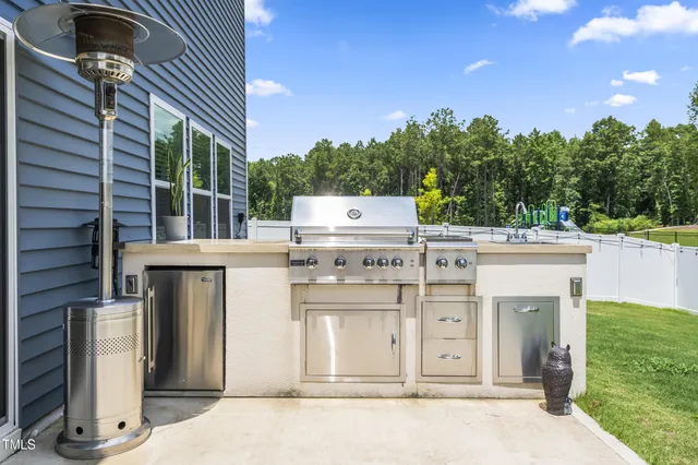 a bathroom with a sink toilet and a mirror