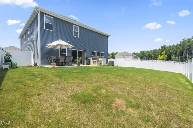 a view of a storage & utility room with a washer dryer