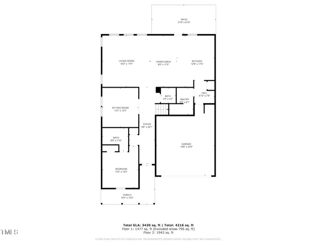 a view of a house with a yard and garage