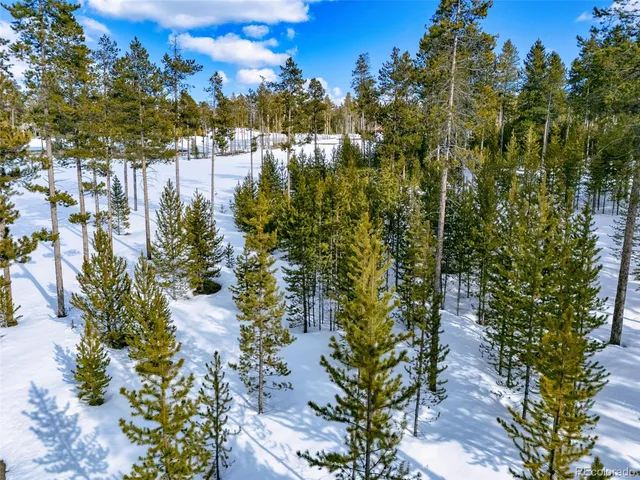 a view of a lake with a building in the background