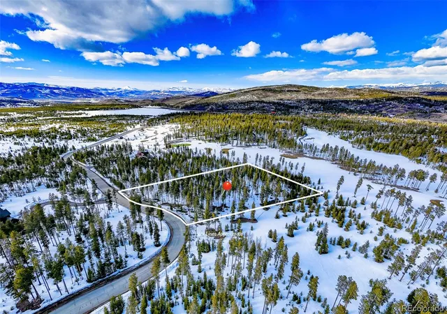 a view of a balcony with an ocean view