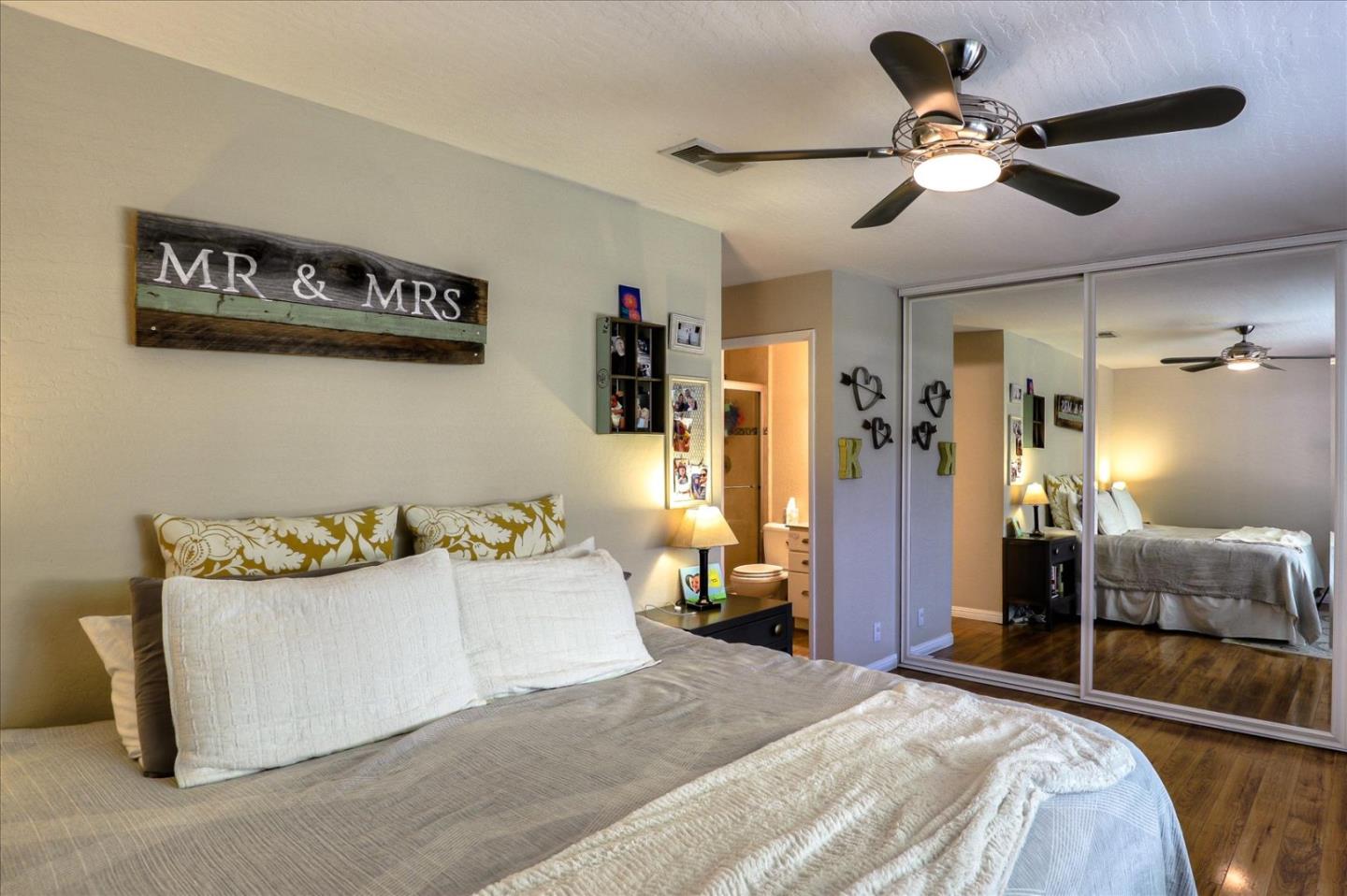 470 Corte Cabanil Morgan Hill, CA 95037 - Photo 16 of 22 a bedroom with a bed and a ceiling fan