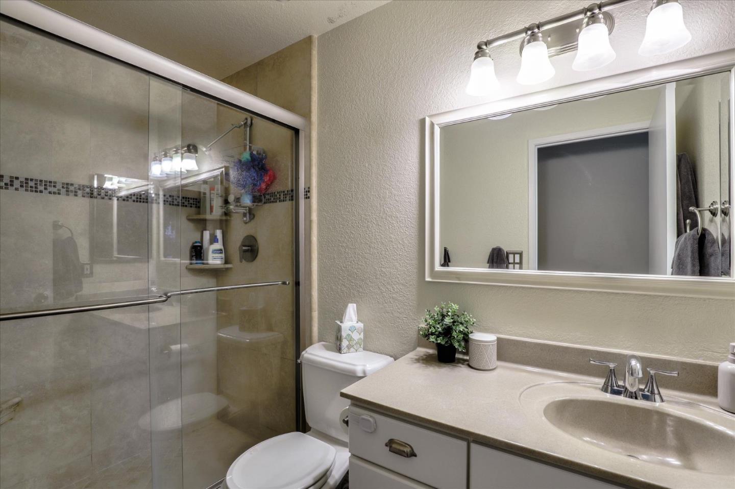 470 Corte Cabanil Morgan Hill, CA 95037 - Photo 17 of 22 a bathroom with a sink a toilet and shower