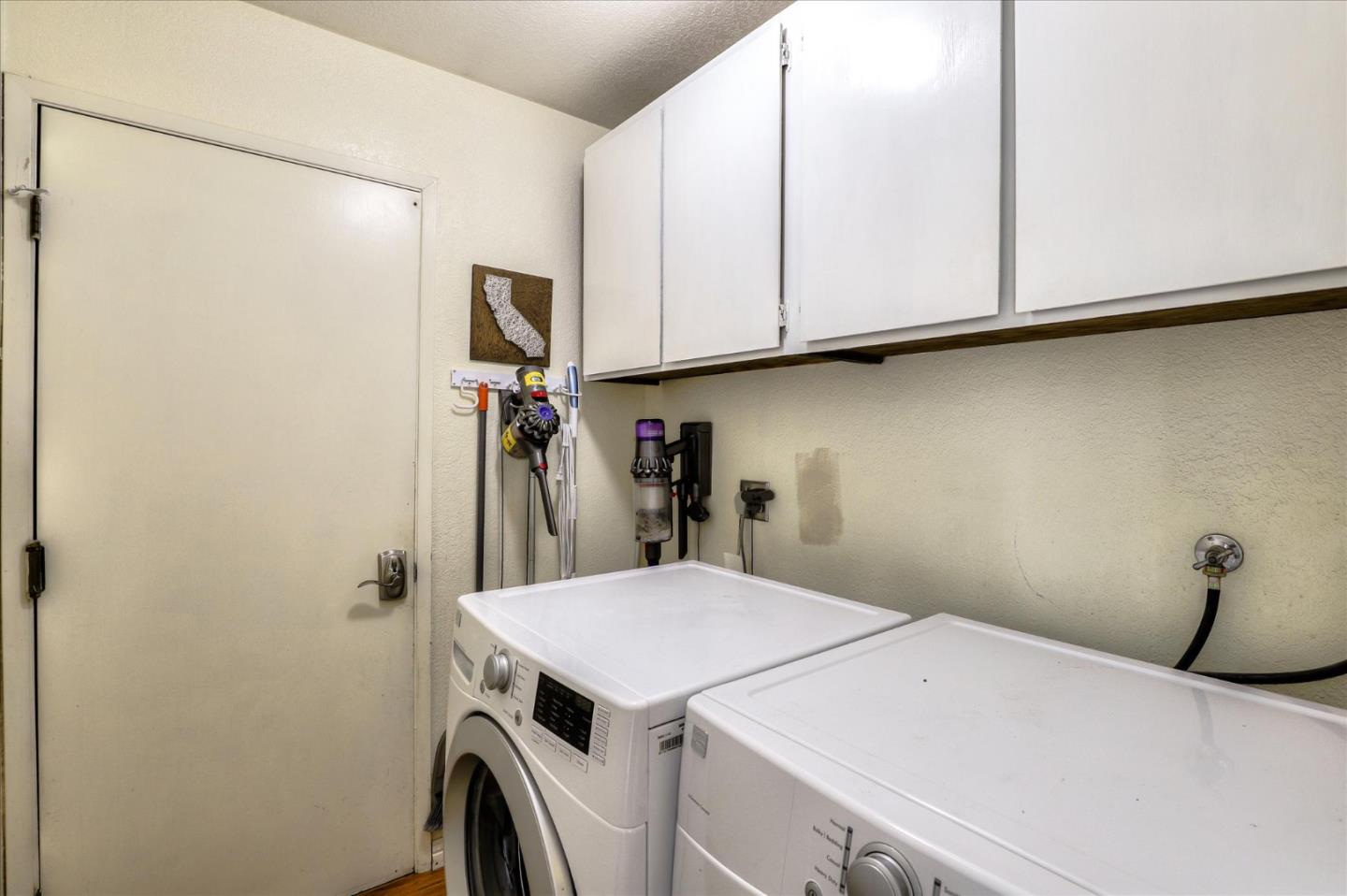 470 Corte Cabanil Morgan Hill, CA 95037 - Photo 18 of 22 a utility room with dryer and washer
