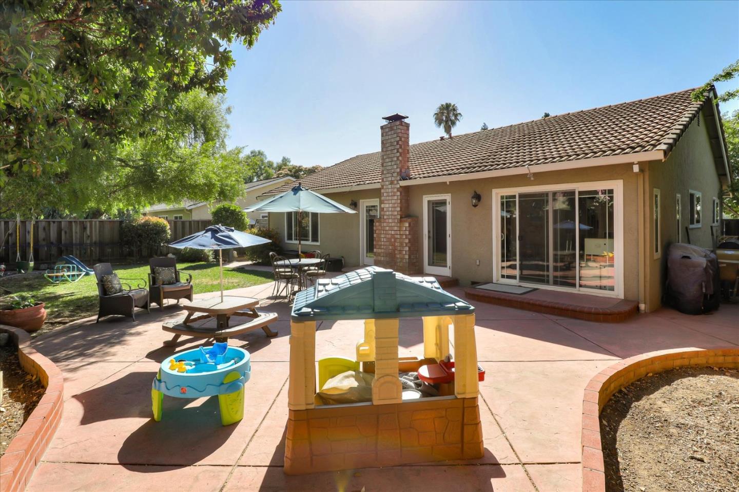 470 Corte Cabanil Morgan Hill, CA 95037 - Photo 20 of 22 a view of a dinning table and chairs in patio