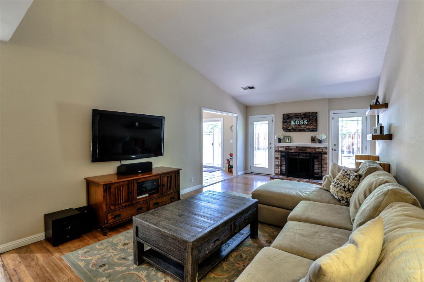 470 Corte Cabanil Morgan Hill, CA 95037 - Photo 6 of 22 a living room with furniture and a flat screen tv