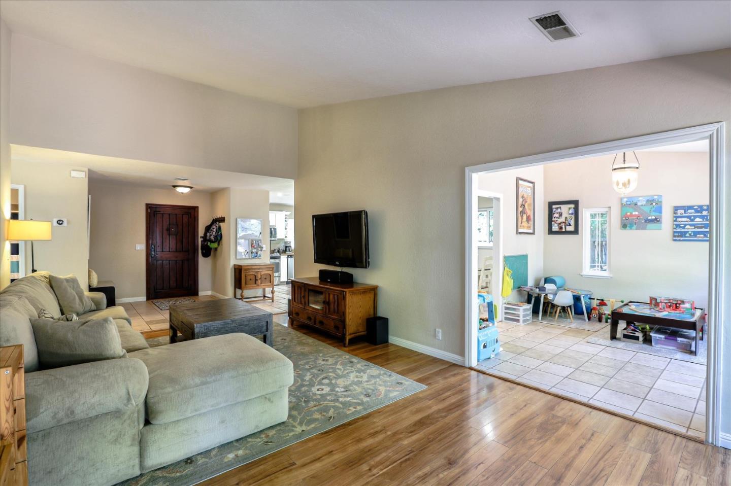 470 Corte Cabanil Morgan Hill, CA 95037 - Photo 7 of 22 a living room with furniture and a flat screen tv