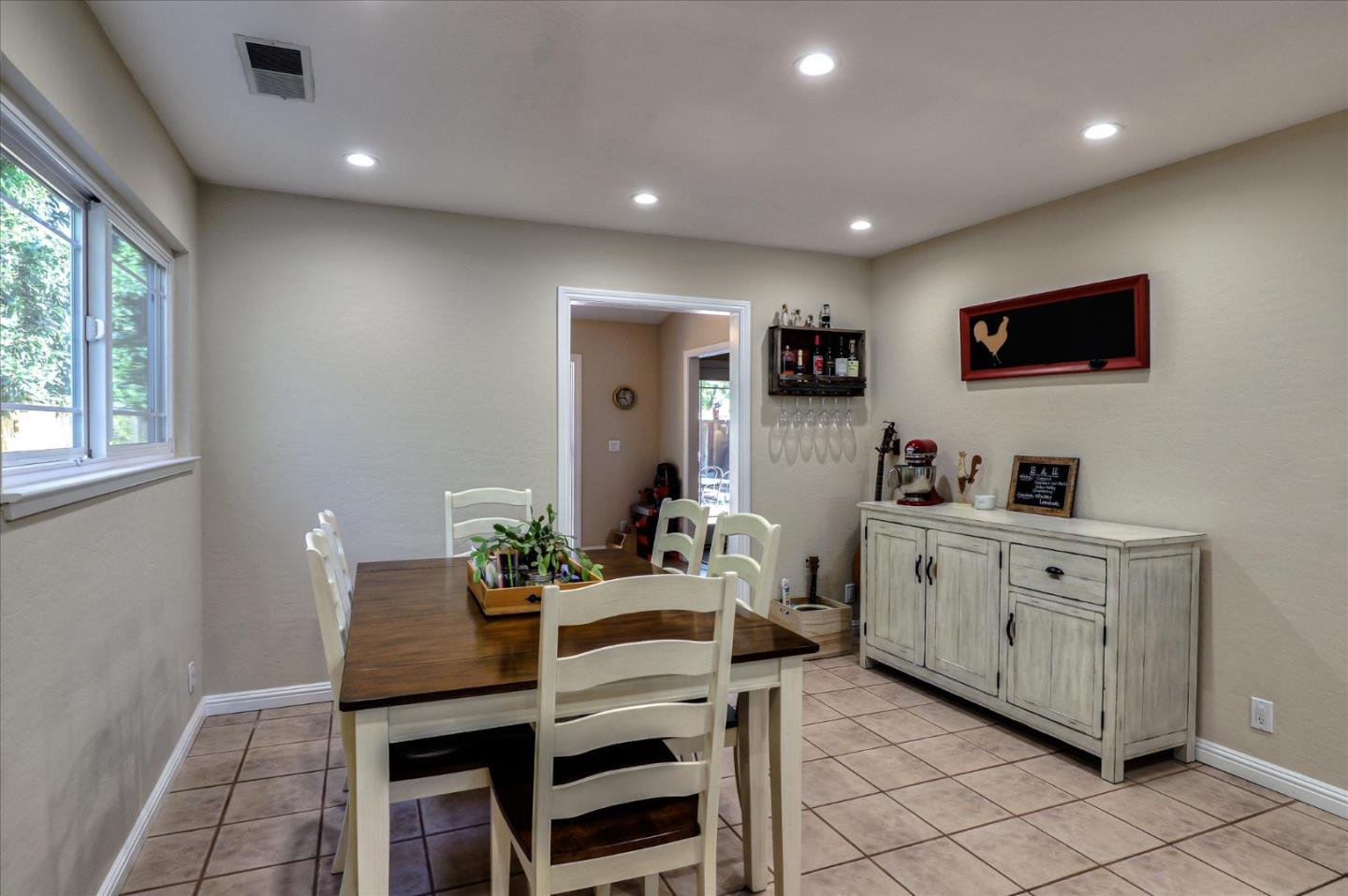 470 Corte Cabanil Morgan Hill, CA 95037 - Photo 10 of 22 a living room with furniture and a flat screen tv