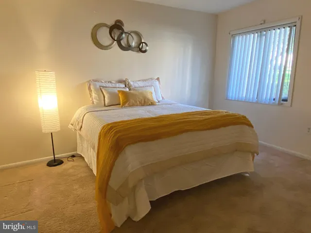 a view of a door and chair in a room