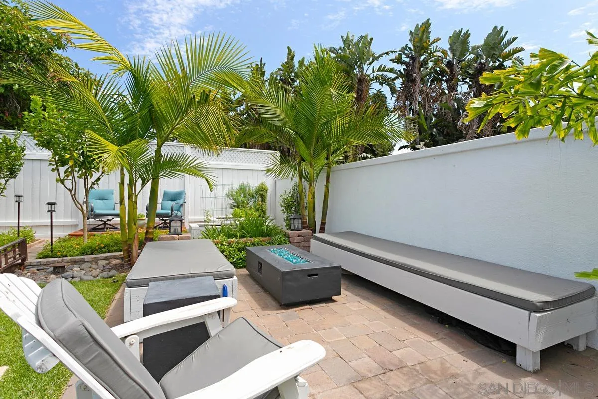 2435 Tuttle Street Carlsbad, CA 92008 - Photo 30 of 38 a view of backyard with outdoor seating and plants
