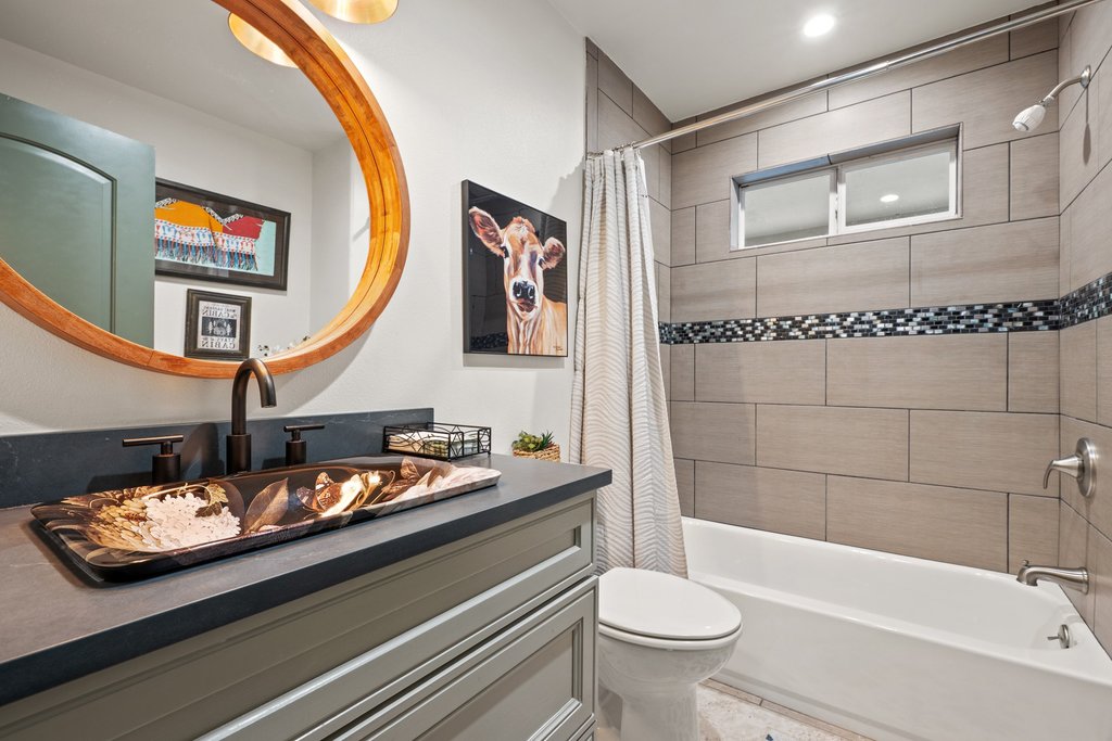2800 River Road Wimberley, TX 78676 - Photo 21 of 40 Bathroom featuring vanity and shower / bath combo