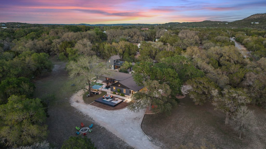 2800 River Road Wimberley, TX 78676 - Photo 40 of 40 View of subject property featuring a forest