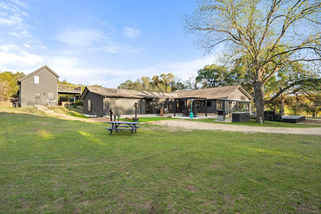 2800 River Road Wimberley, TX 78676 - Photo 5 of 40 View of community with a patio area