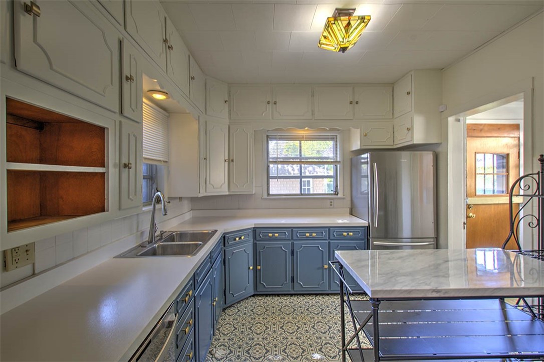 531 West William Street Decatur, IL 62522 - Photo 7 of 28 a kitchen with counter space cabinets and appliances