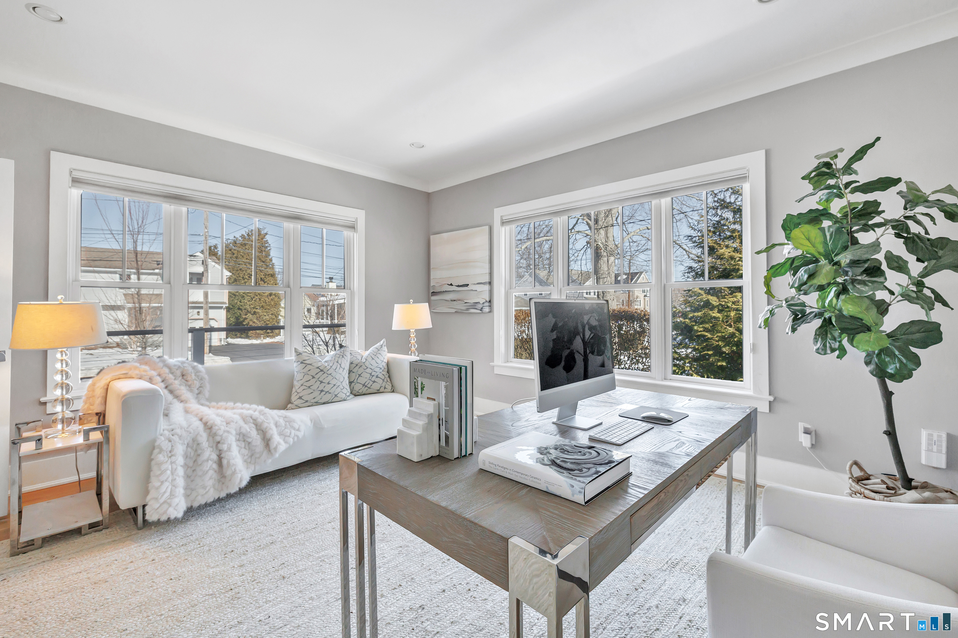 598 South Benson Road Fairfield, CT 06824 - Photo 15 of 40 a living room with furniture and a large window