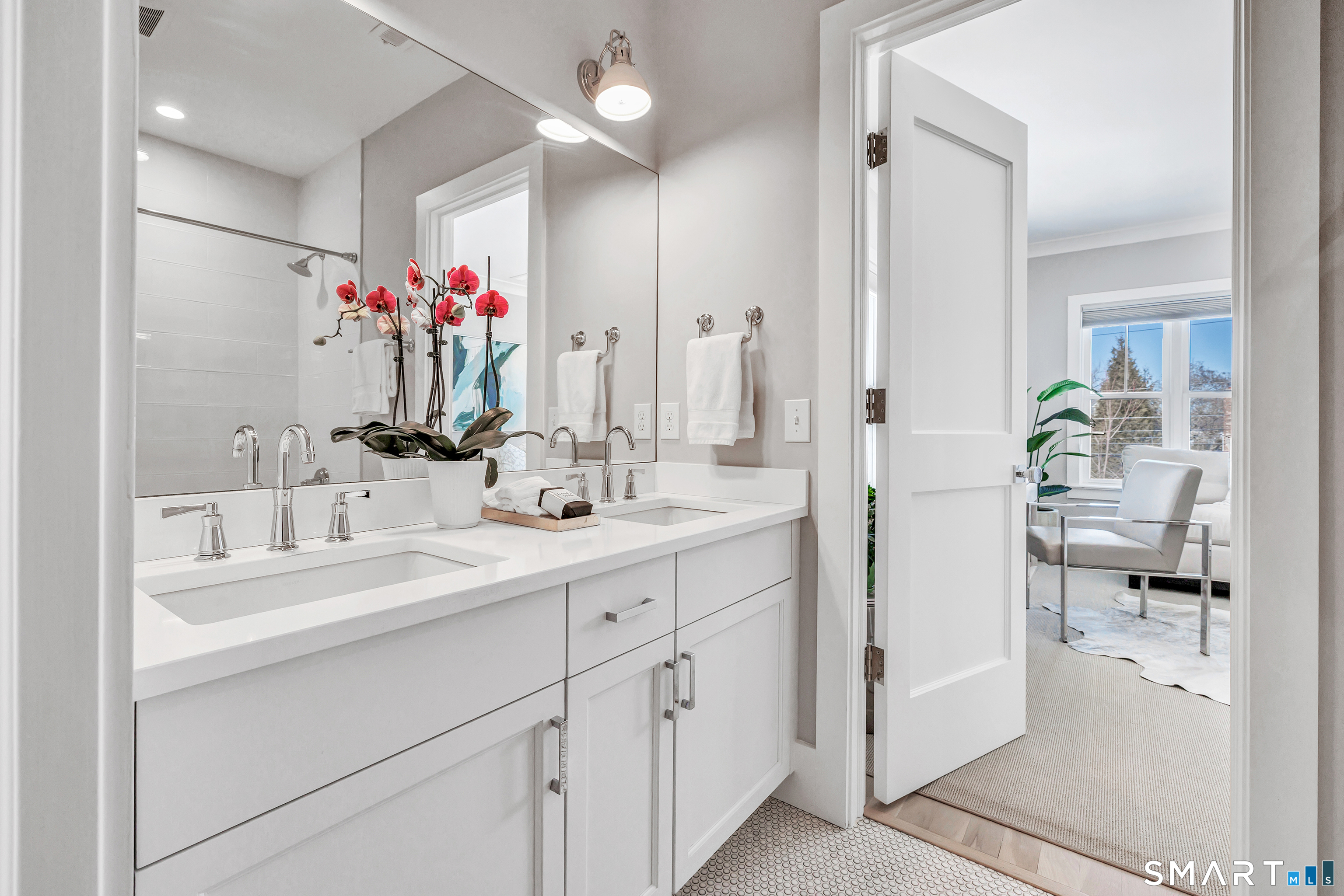 598 South Benson Road Fairfield, CT 06824 - Photo 24 of 40 a bathroom with a sink vanity and a mirror