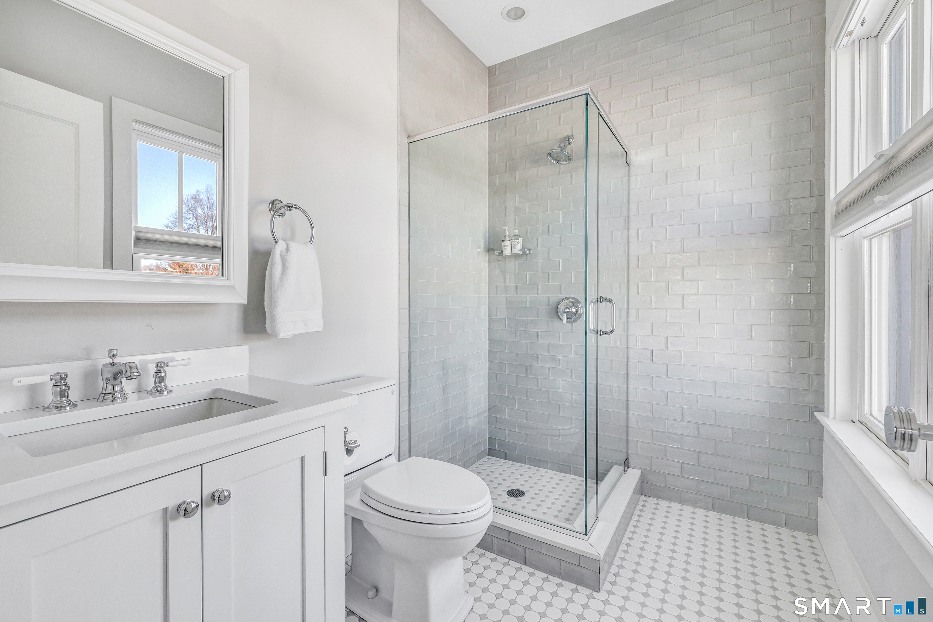 598 South Benson Road Fairfield, CT 06824 - Photo 29 of 40 a bathroom with a sink a toilet and shower