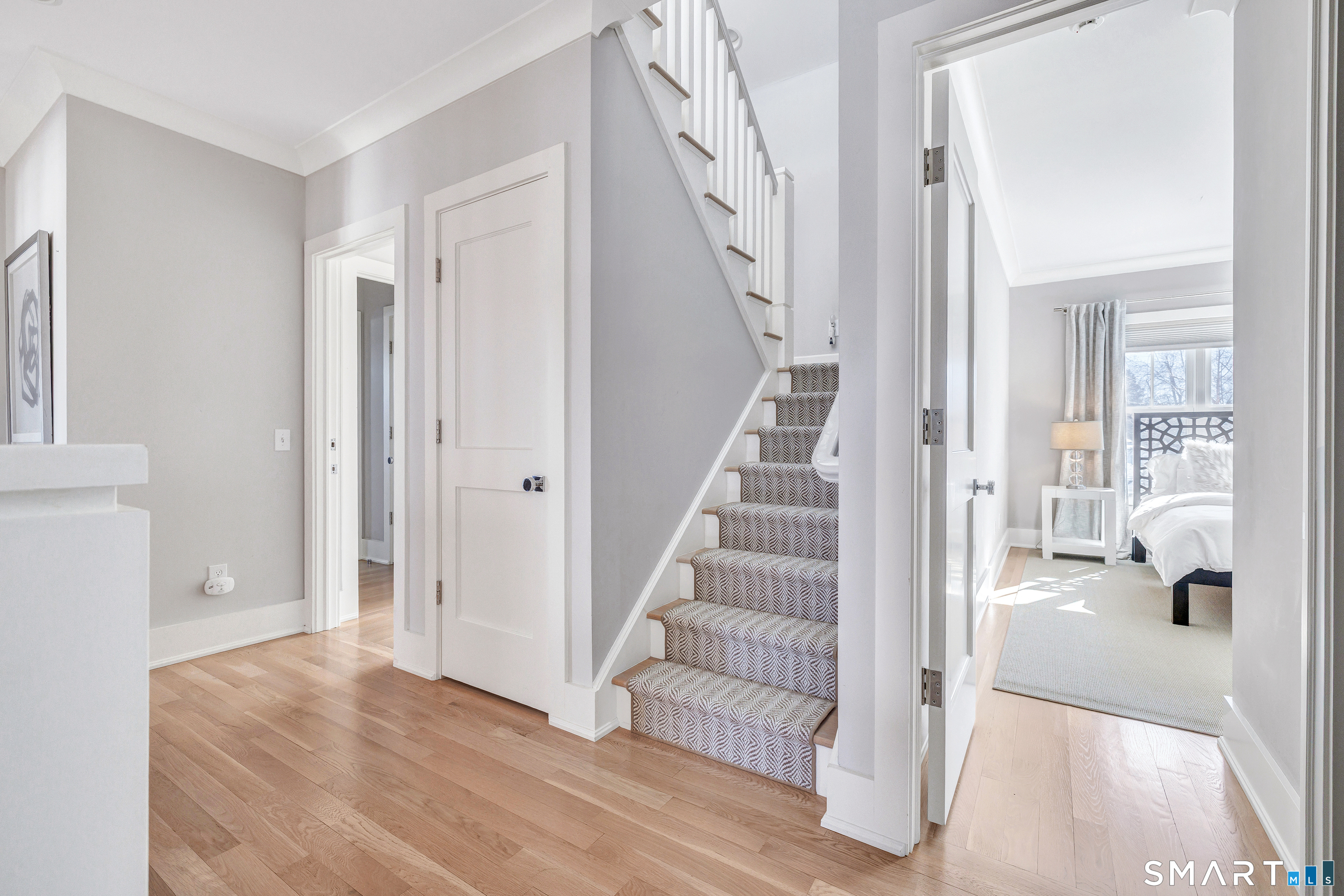 598 South Benson Road Fairfield, CT 06824 - Photo 30 of 40 a view of a hallway with wooden floor and entryway