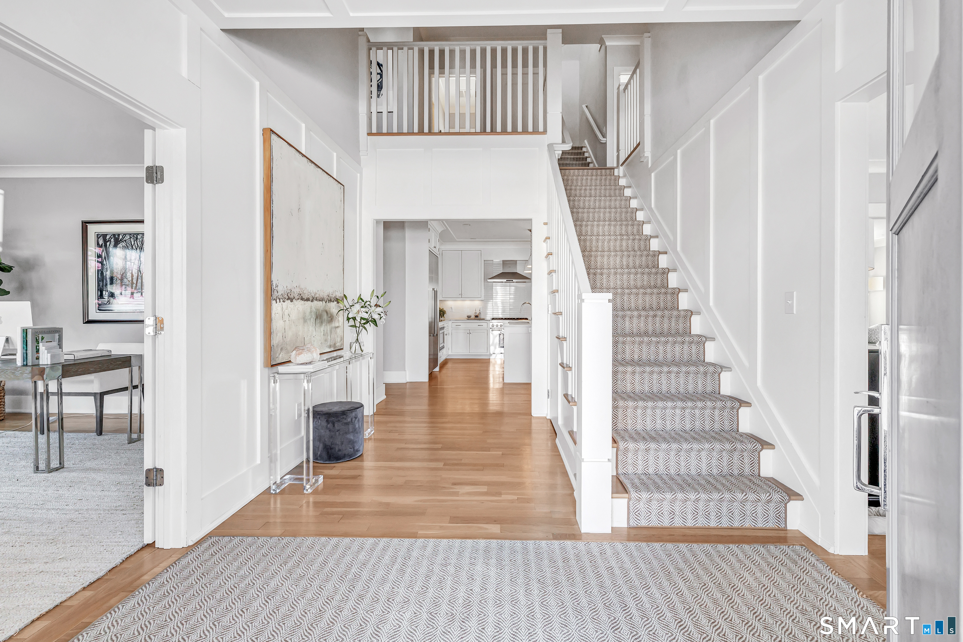598 South Benson Road Fairfield, CT 06824 - Photo 3 of 40 a view of entryway and hall with wooden floor