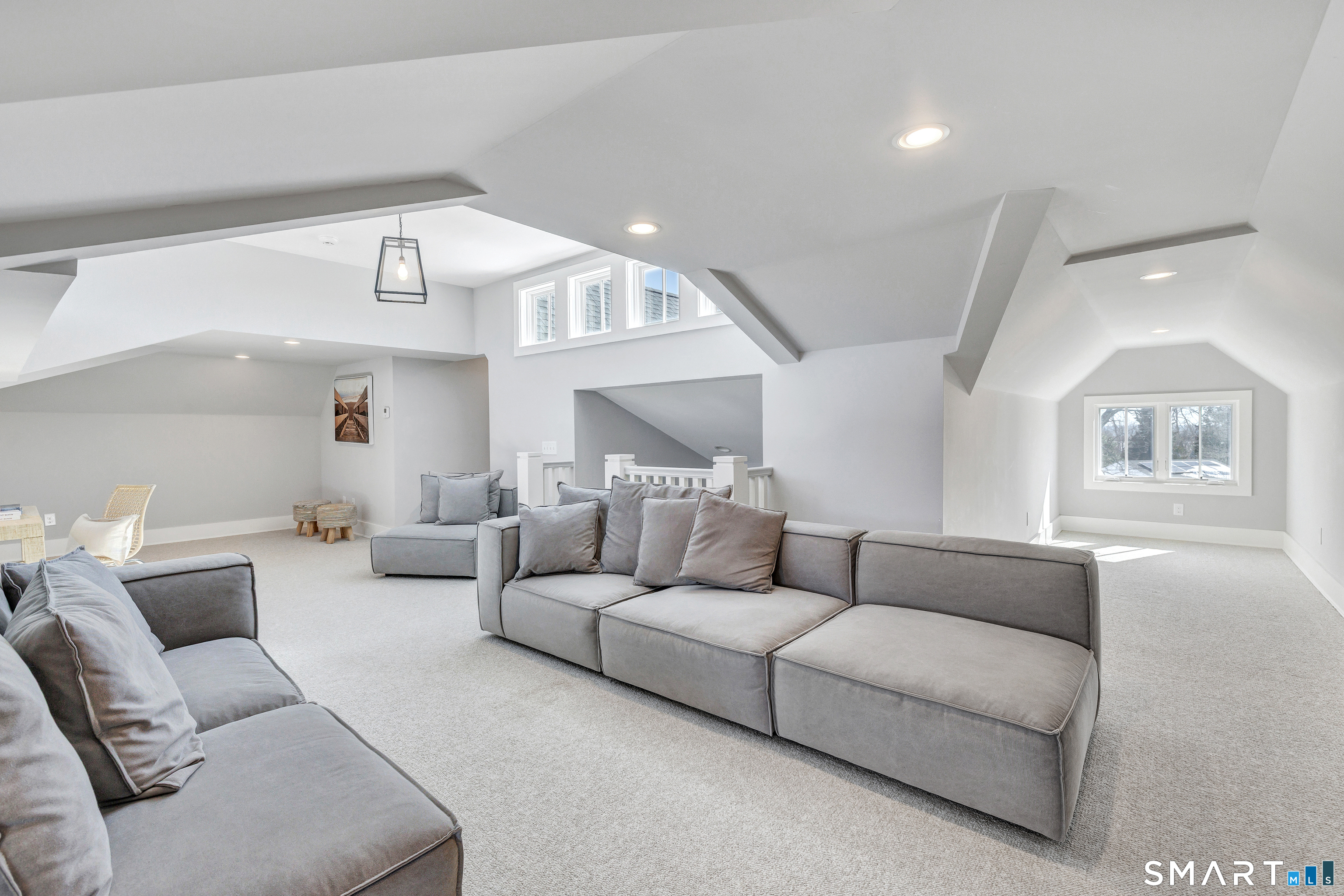 598 South Benson Road Fairfield, CT 06824 - Photo 32 of 40 a living room with furniture and a large window