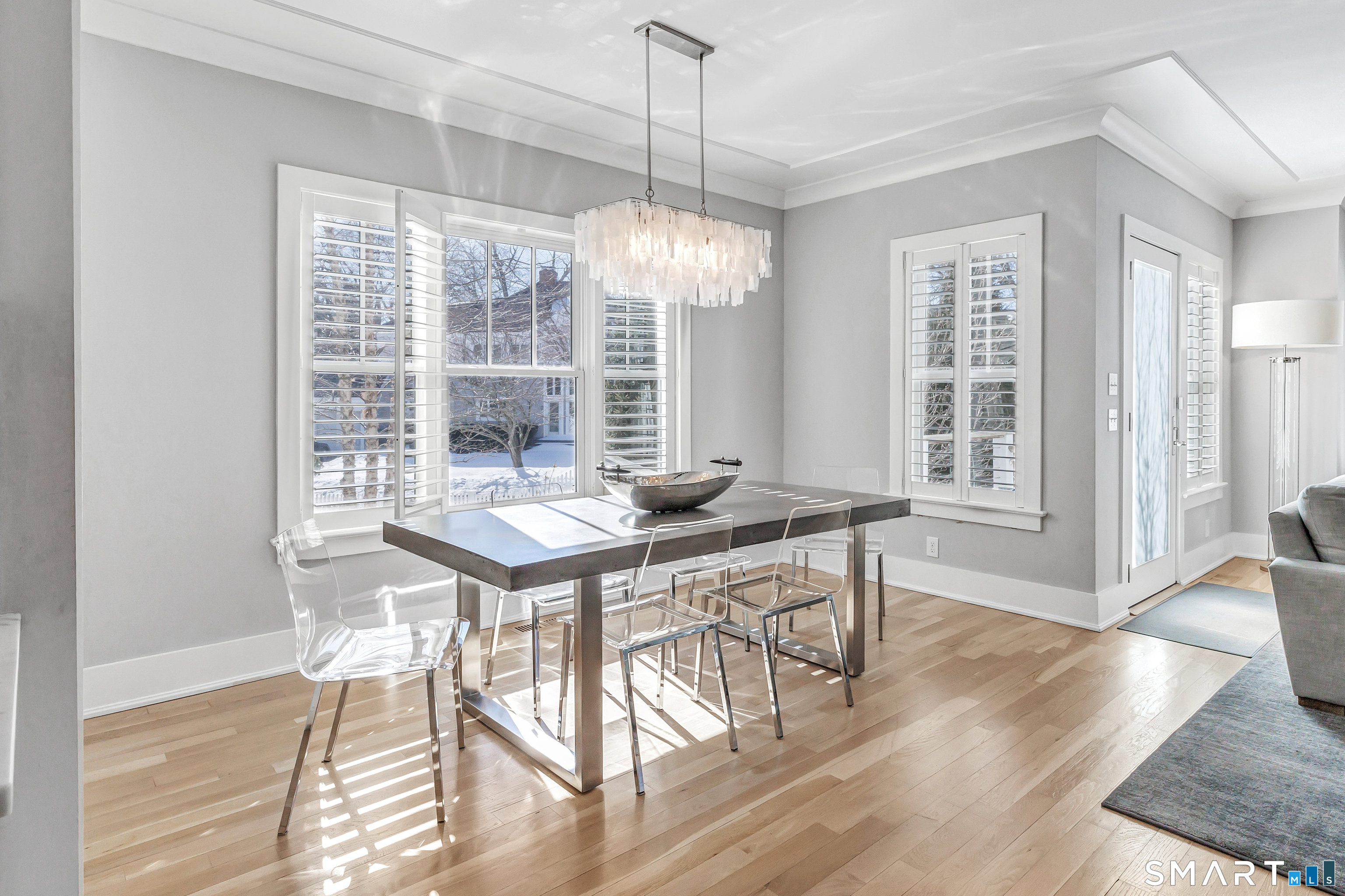 598 South Benson Road Fairfield, CT 06824 - Photo 8 of 40 a view of a dining room with furniture window and wooden floor