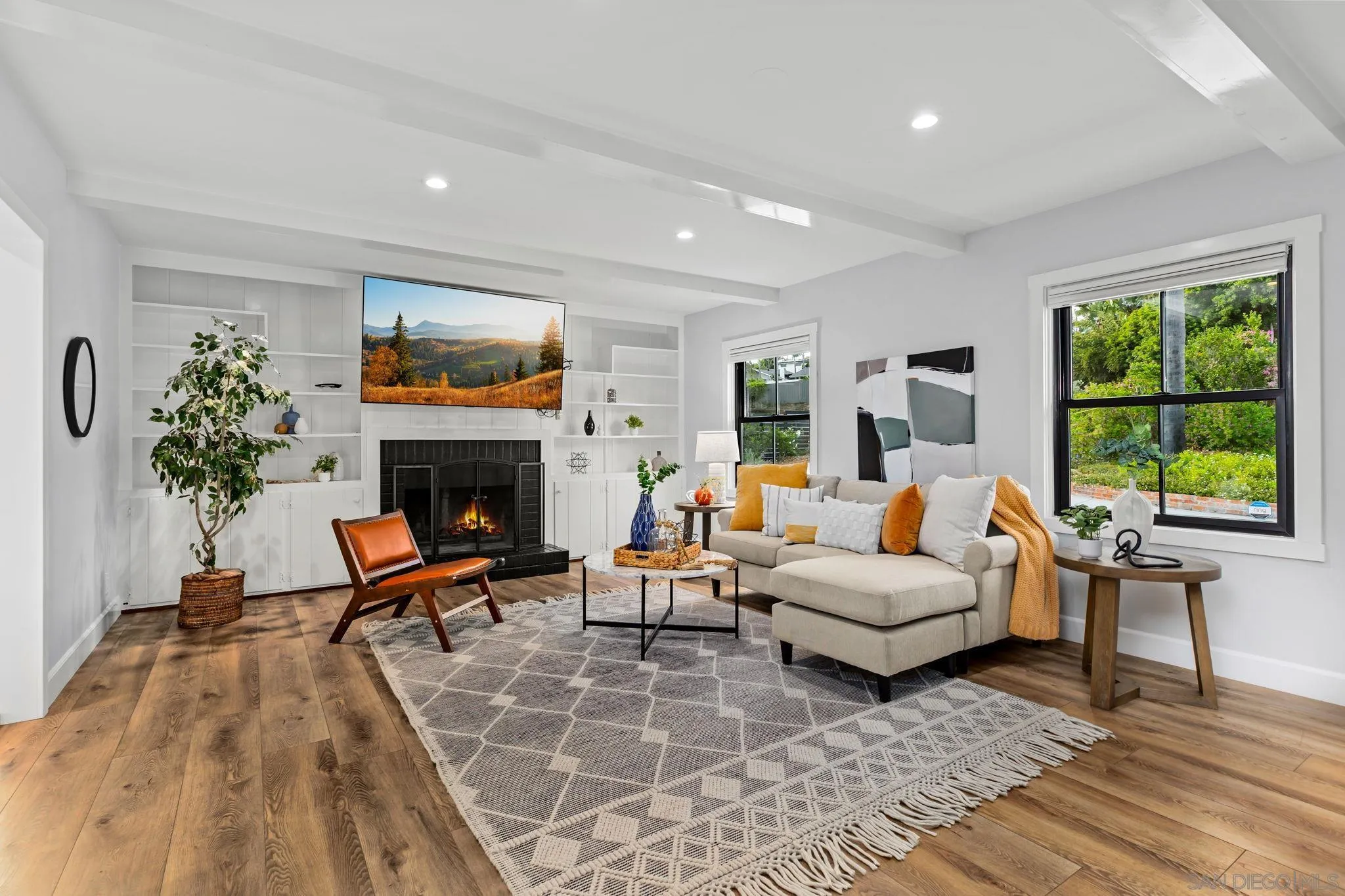 2335 Ivy Road Oceanside, CA 92054 - Photo 11 of 53 a living room with furniture fireplace and window