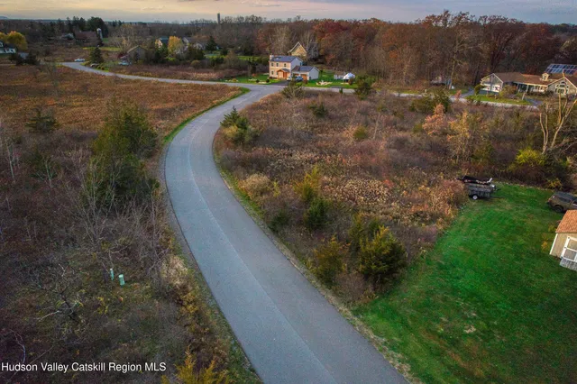 a view of a street with a houses