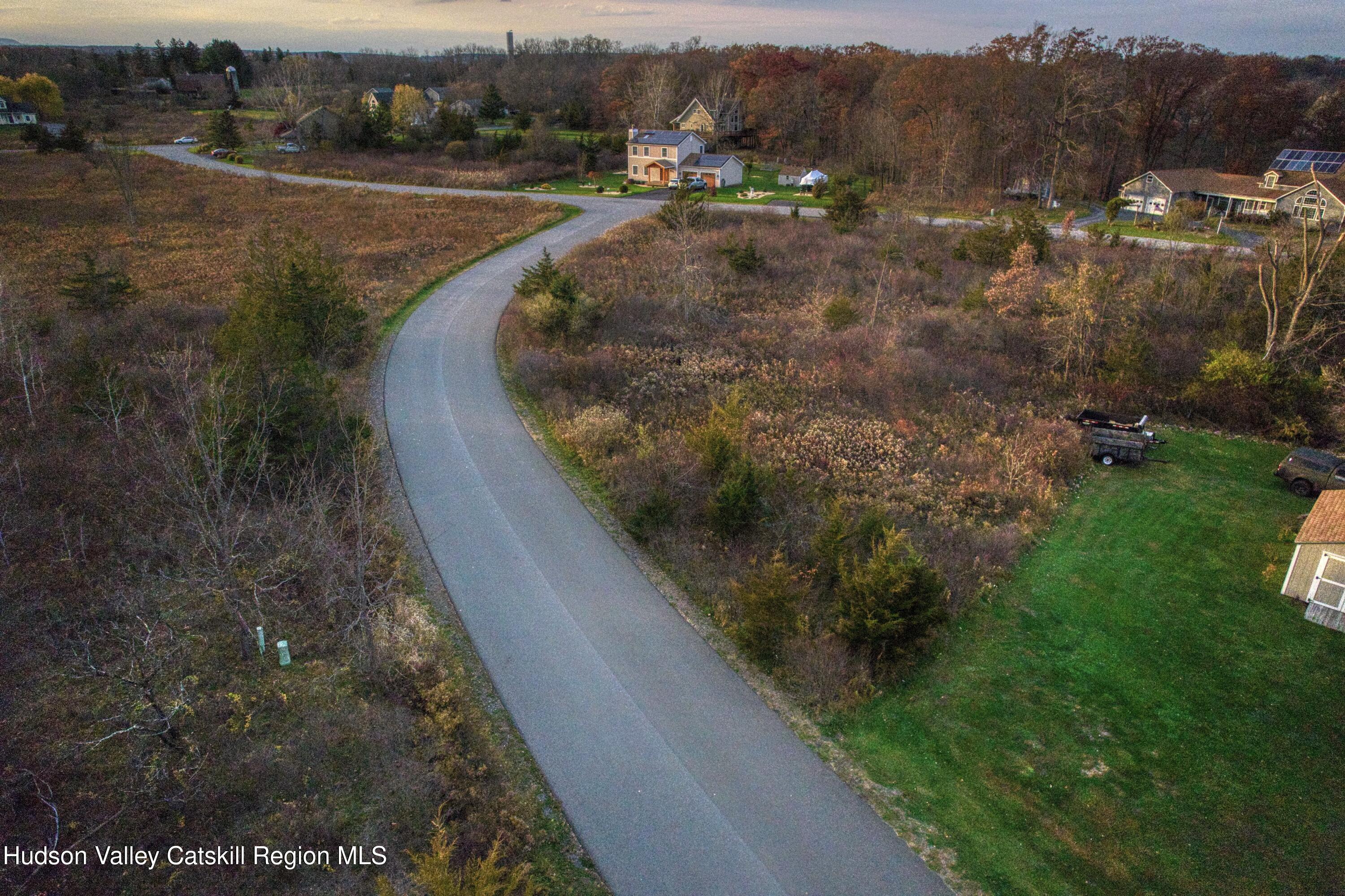 248 Travis Place Athens, NY 12015 - Photo 4 of 12 a view of a street with a houses