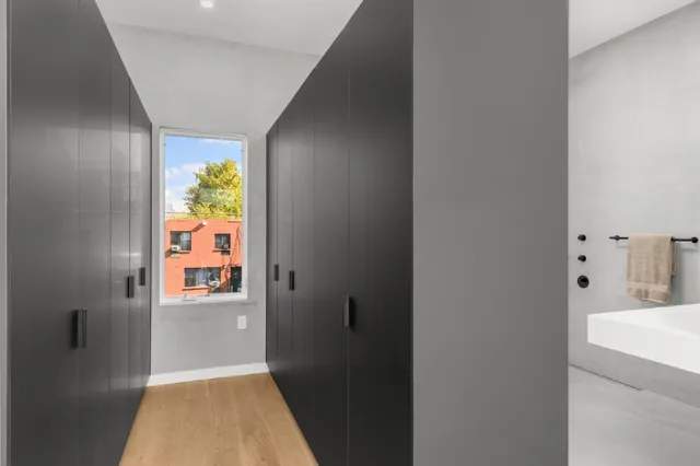 a bathroom with a tub and shower