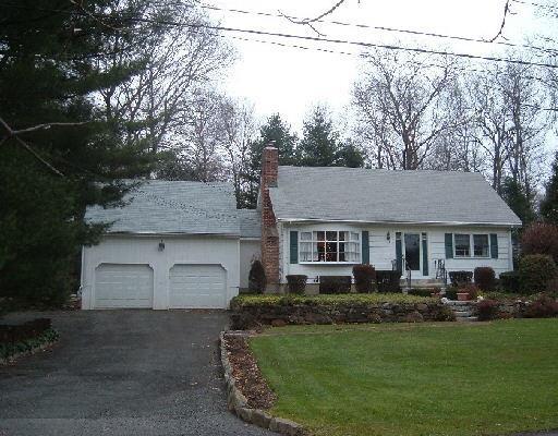 3 Seymour Lane Ridgefield, CT 06877 - Photo 1 of 1 a front view of a house with garden