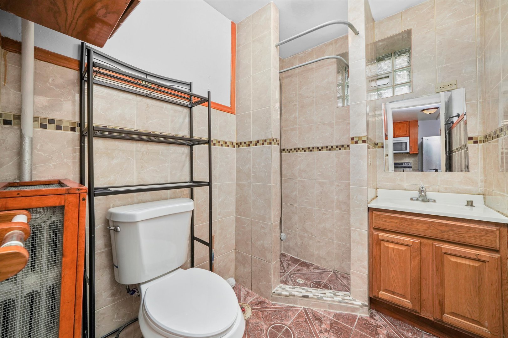 1450 North Springfield Avenue Chicago, IL 60651 - Photo 23 of 46 a bathroom with a toilet sink shower and mirror