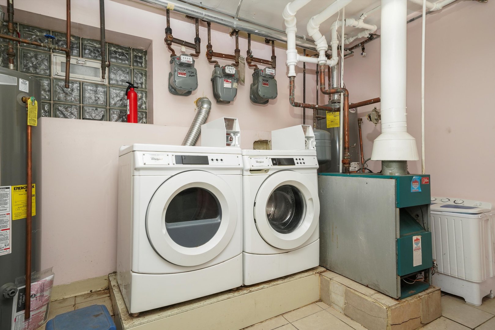 1450 North Springfield Avenue Chicago, IL 60651 - Photo 24 of 46 a utility room with dryer and washer