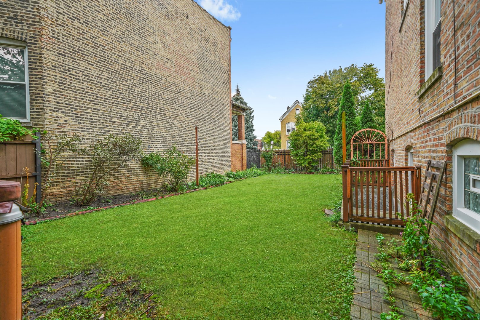 1450 North Springfield Avenue Chicago, IL 60651 - Photo 29 of 46 a view of outdoor space and garden