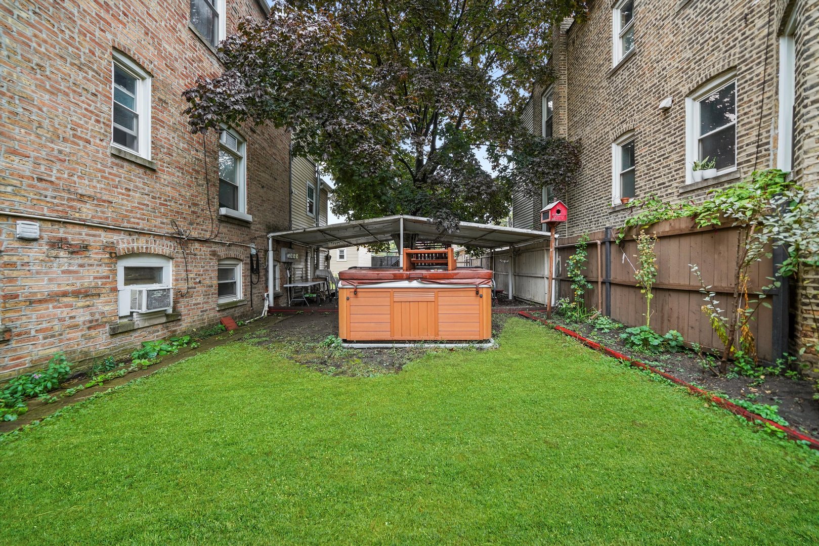1450 North Springfield Avenue Chicago, IL 60651 - Photo 30 of 46 a front view of house with yard