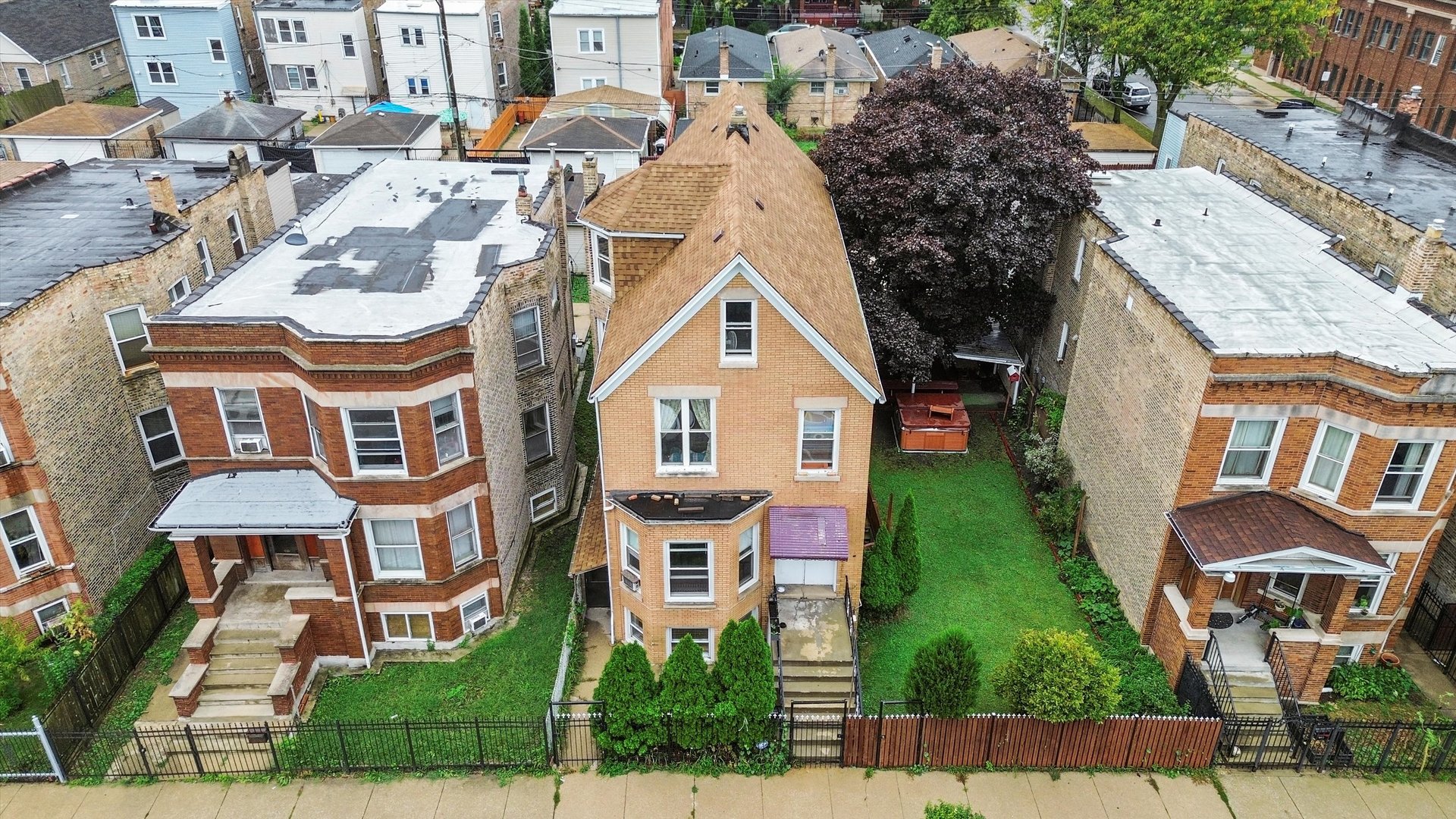 1450 North Springfield Avenue Chicago, IL 60651 - Photo 41 of 46 an aerial view of multiple houses