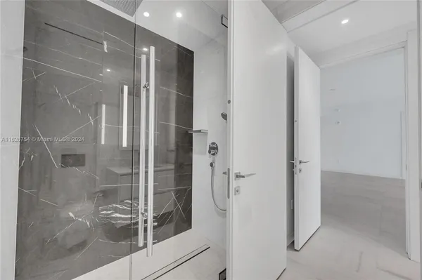 a view of a storage & utility room with a washer and dryer